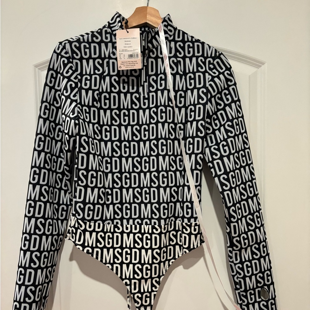 New with tag skiing waterproof bodysuit misguided